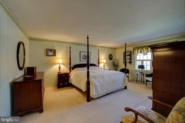 bedroom with light colored carpet and crown molding