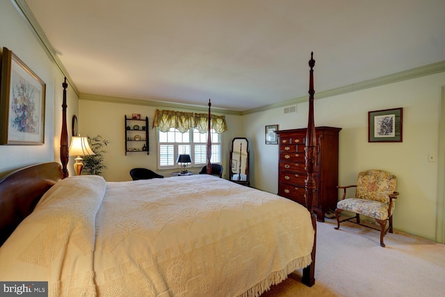 carpeted bedroom featuring ornamental molding and visible vents