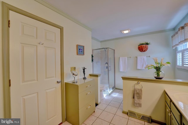 full bath with a shower stall, visible vents, ornamental molding, and vanity