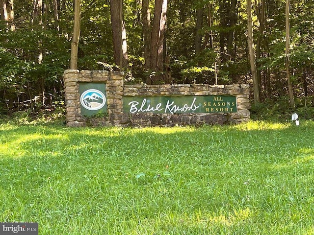 view of community sign