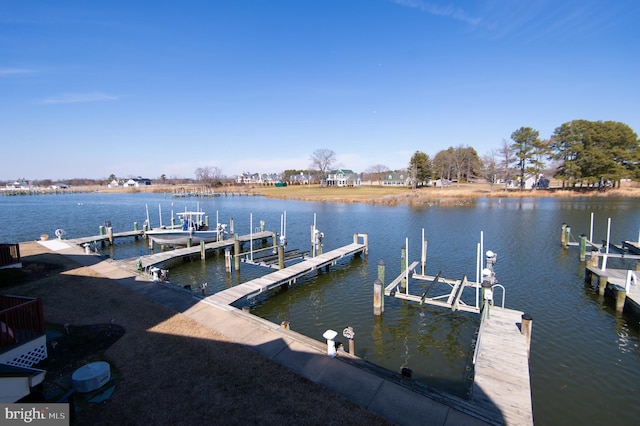 view of dock with a water view and boat lift