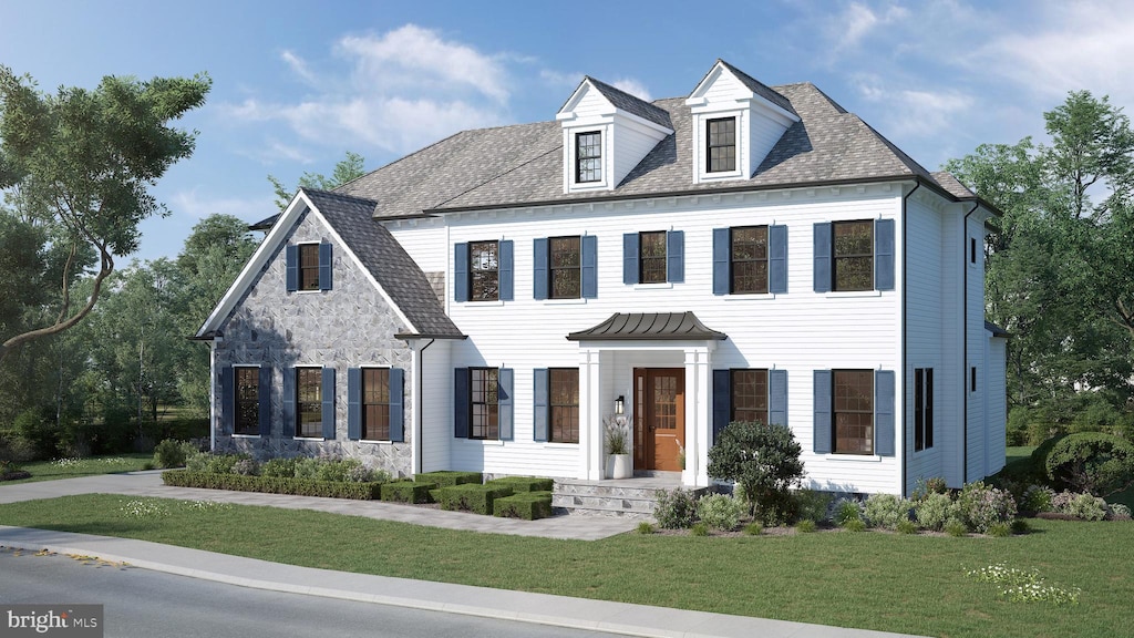 view of front of property with stone siding, roof with shingles, and a front yard