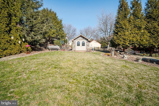 view of yard featuring fence