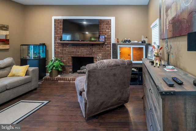 living room with a fireplace and dark wood finished floors