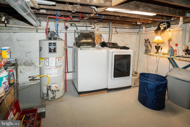 unfinished below grade area with washing machine and dryer and water heater