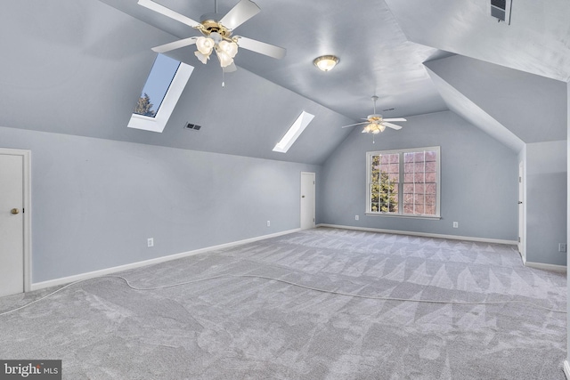 additional living space featuring visible vents, carpet floors, and baseboards