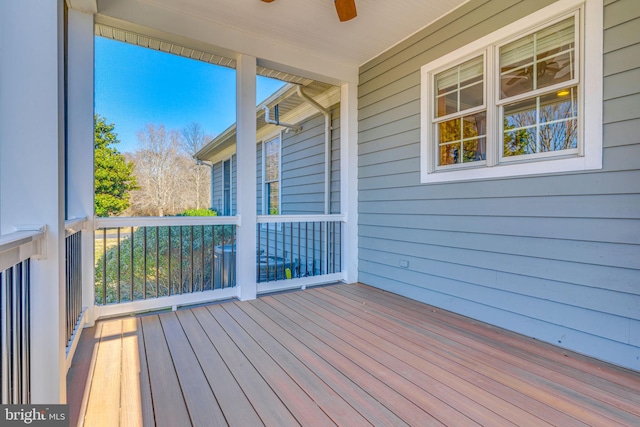 wooden terrace with ceiling fan