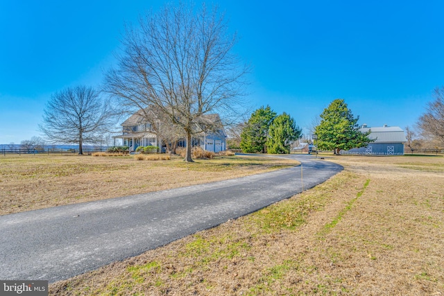 view of street with driveway