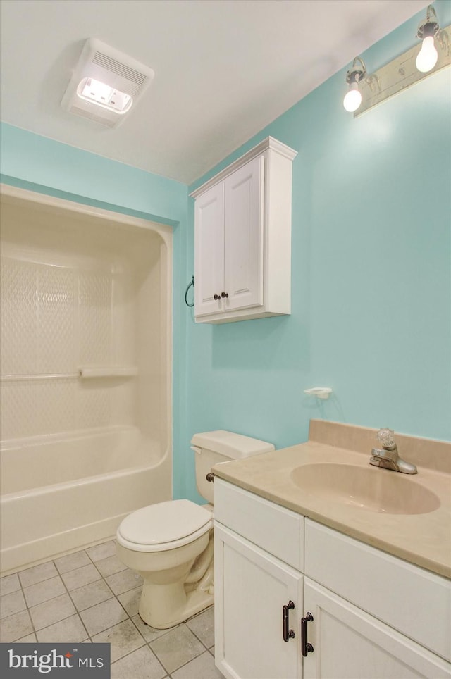 full bathroom featuring vanity, shower / tub combination, tile patterned flooring, and toilet