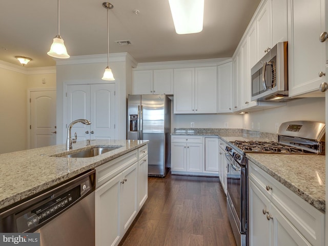 kitchen with visible vents, white cabinets, appliances with stainless steel finishes, crown molding, and a sink