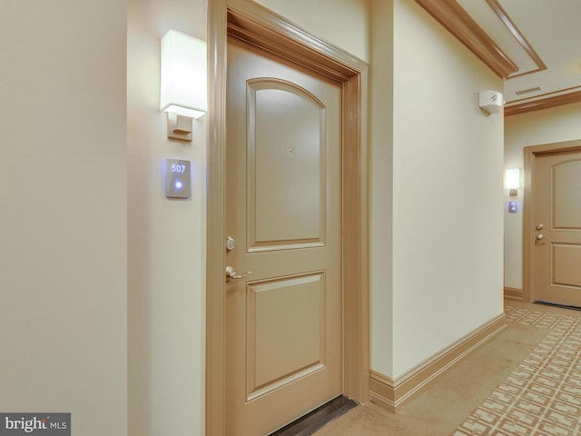 doorway to property featuring visible vents