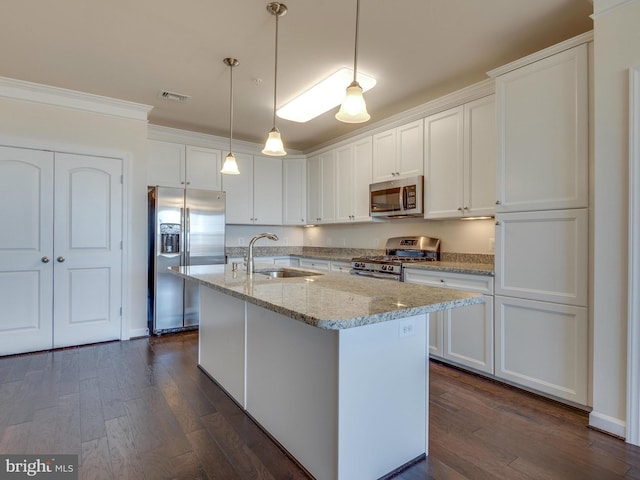 kitchen with visible vents, appliances with stainless steel finishes, dark wood-style flooring, white cabinetry, and a sink