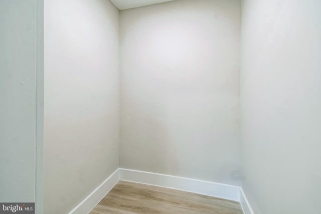 interior space featuring light wood-style floors and baseboards