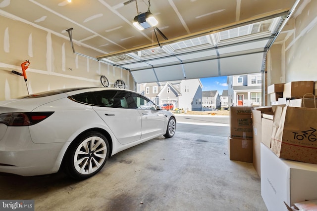 garage featuring a garage door opener