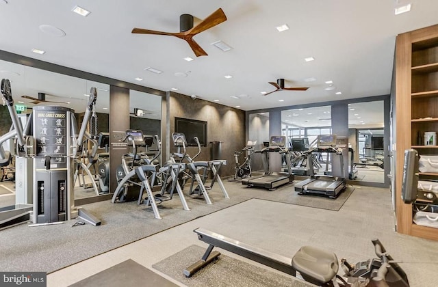 gym featuring visible vents and a ceiling fan