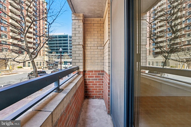 balcony featuring a view of city