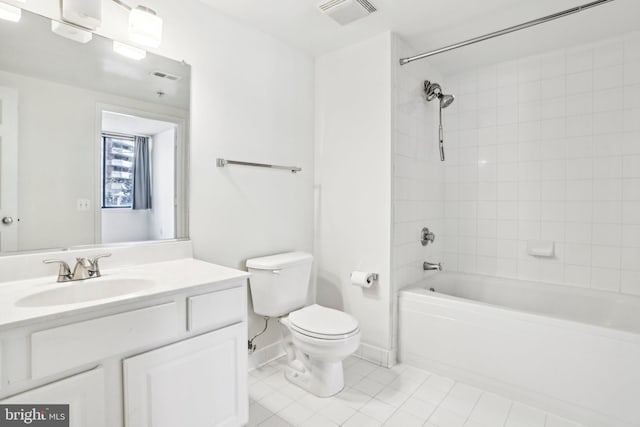 bathroom with visible vents, shower / bathing tub combination, toilet, vanity, and tile patterned flooring