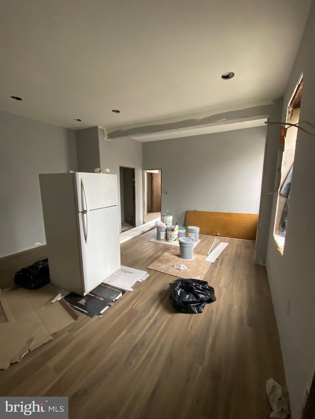 unfurnished dining area with wood finished floors