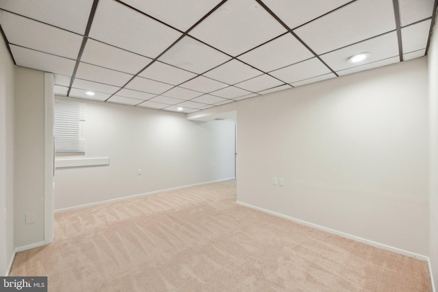 finished below grade area featuring carpet floors, baseboards, recessed lighting, and a drop ceiling