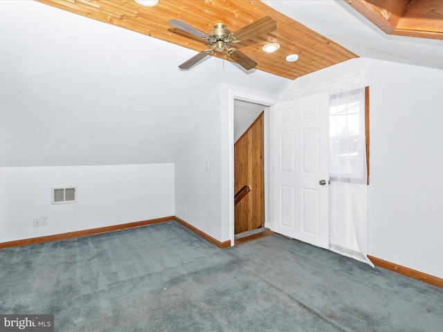 bonus room with lofted ceiling, carpet, visible vents, and baseboards