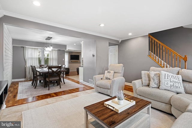 living area with recessed lighting, stairway, baseboards, and crown molding