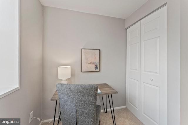 office area featuring carpet and baseboards