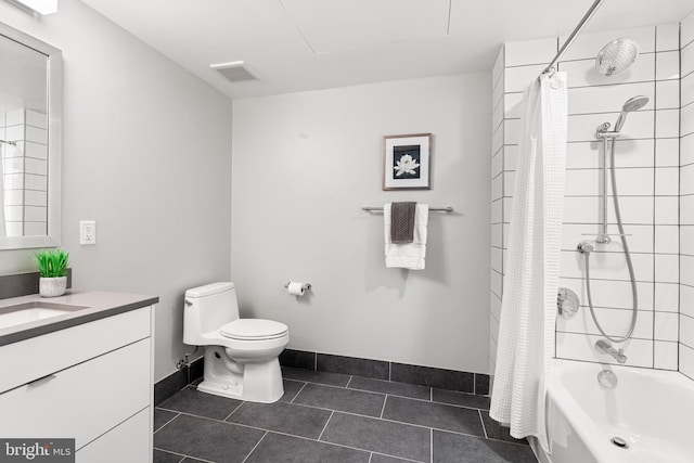 bathroom with shower / tub combo, baseboards, toilet, tile patterned flooring, and vanity