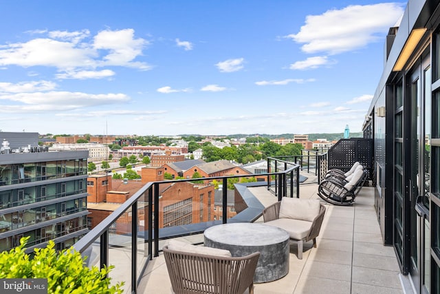 balcony featuring a view of city