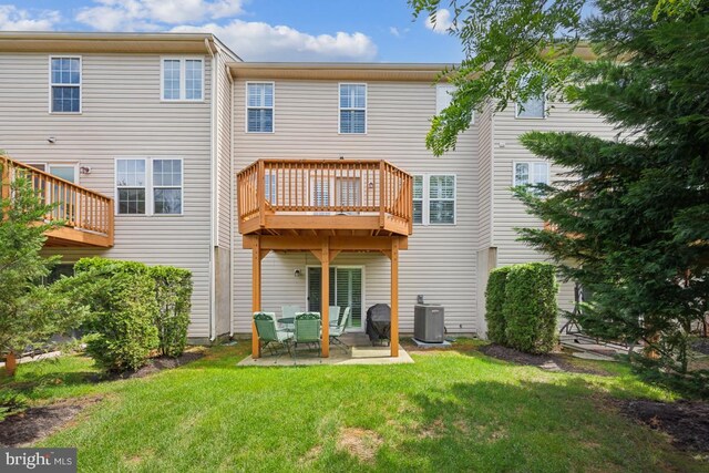 1593 Jason Dr, Cinnaminson, NJ 08077 - back of property featuring a lawn, a patio, central AC, and a deck