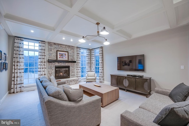 living room with baseboards, coffered ceiling, and light colored carpet