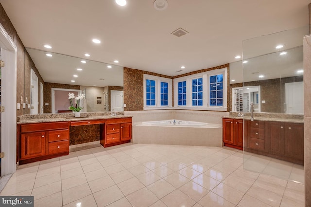 full bathroom with recessed lighting, tile patterned flooring, a garden tub, and vanity