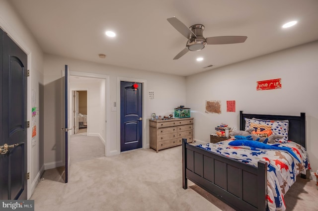 bedroom featuring baseboards, recessed lighting, a ceiling fan, and light colored carpet