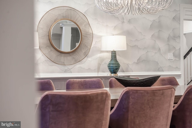 dining space featuring an inviting chandelier