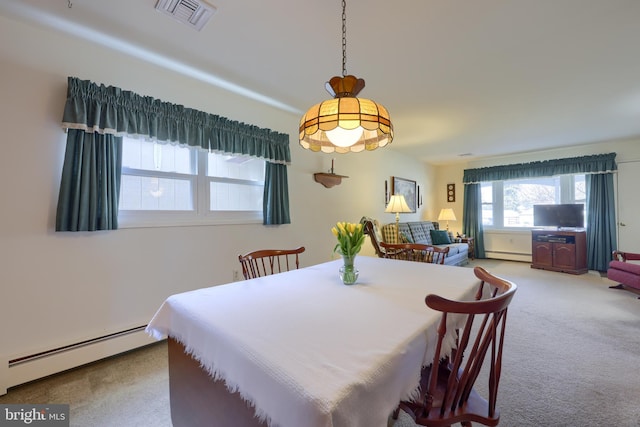 dining area with baseboard heating, carpet, and visible vents