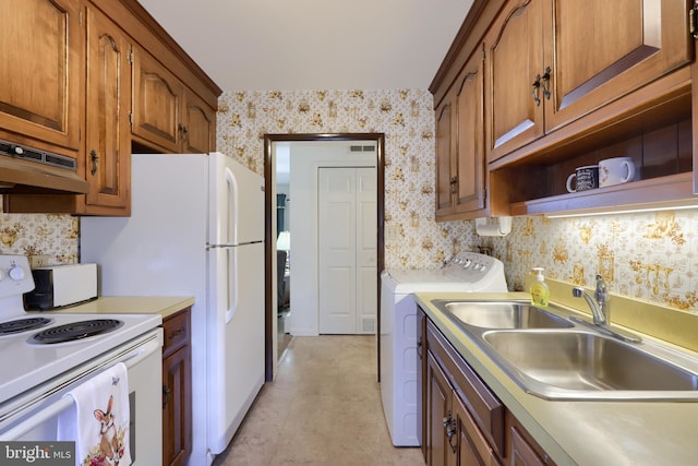 kitchen featuring wallpapered walls, white range with electric stovetop, light countertops, under cabinet range hood, and a sink