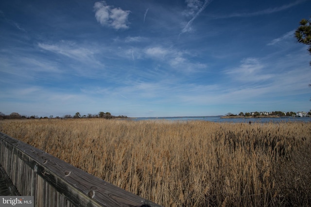 exterior space with a water view