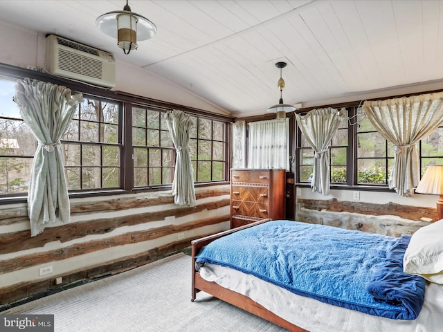 carpeted bedroom with lofted ceiling, an AC wall unit, and wood ceiling