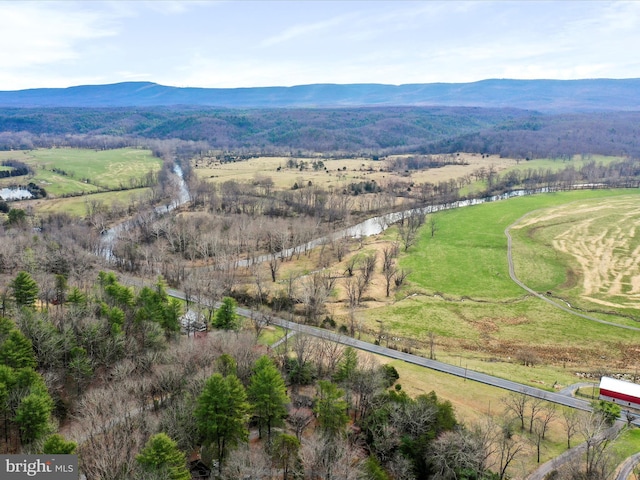 bird's eye view with a mountain view and a rural view