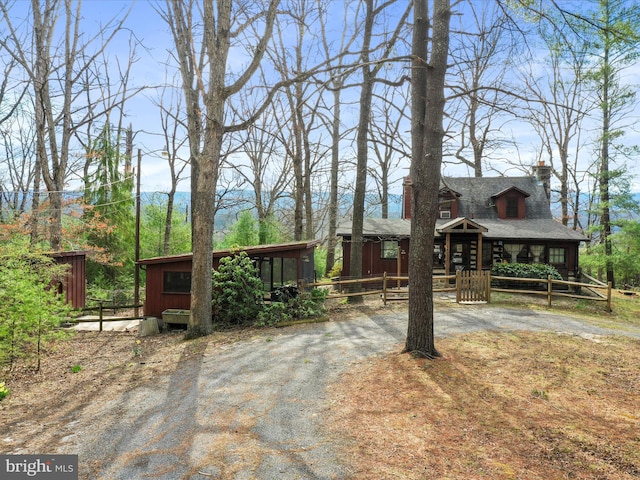rustic home with a chimney