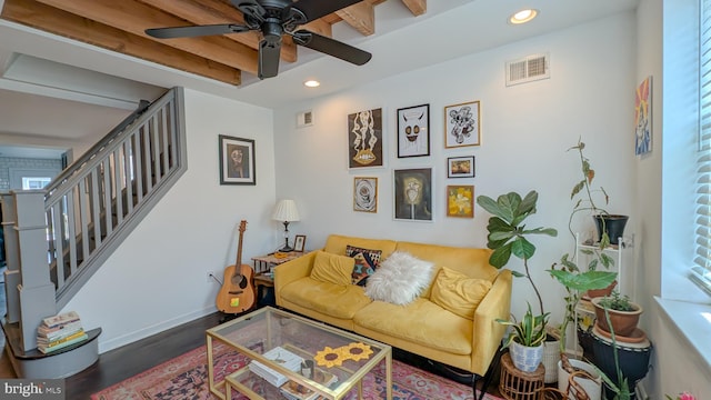 living room featuring recessed lighting, visible vents, stairway, and wood finished floors