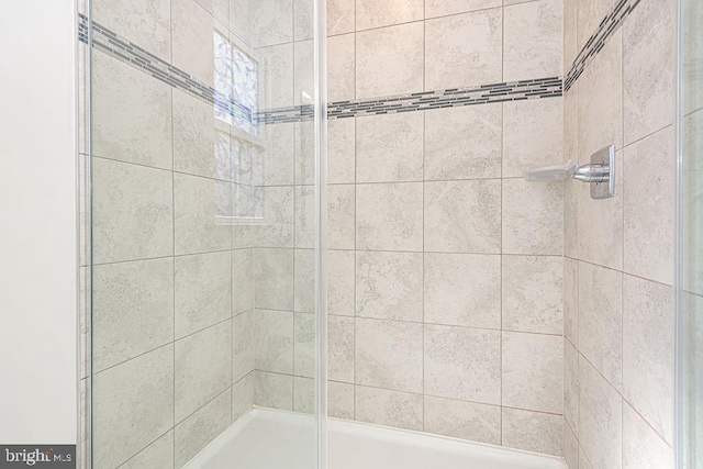 bathroom featuring a stall shower