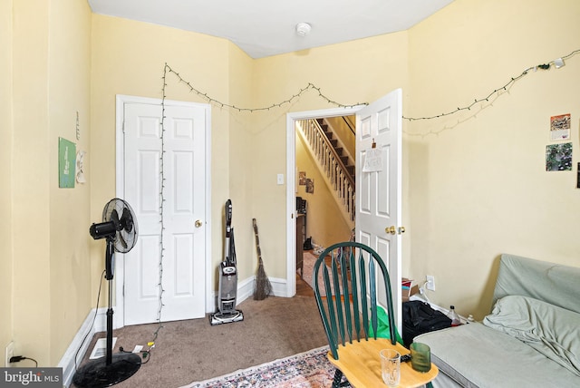 carpeted bedroom with baseboards