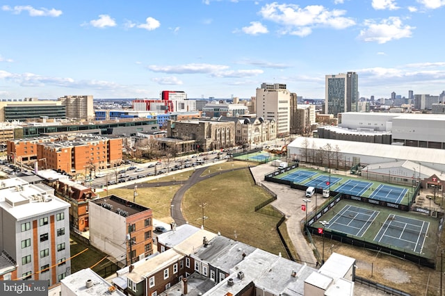 birds eye view of property featuring a city view