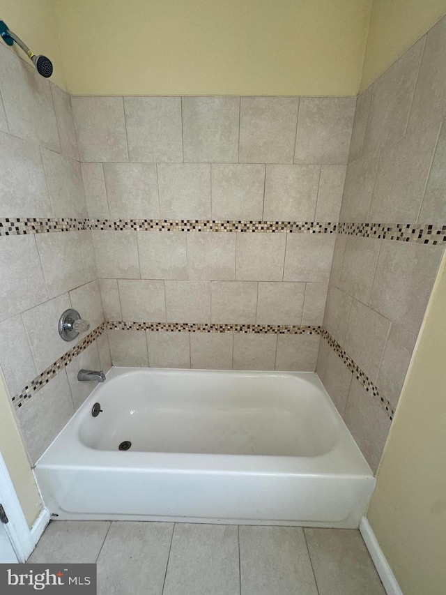 full bathroom featuring shower / bathtub combination and tile patterned floors