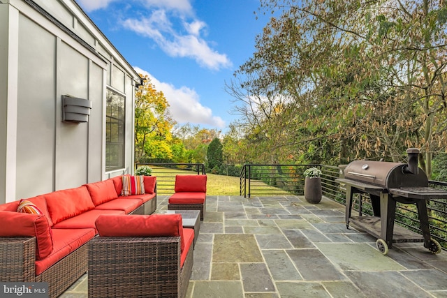 view of patio / terrace with an outdoor hangout area and a grill