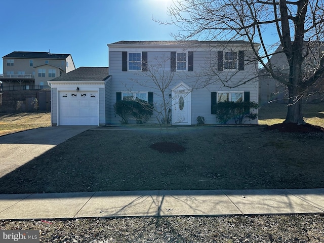 view of front of home featuring a garage and concrete driveway