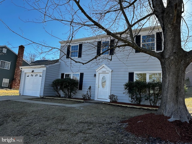 colonial house featuring a garage