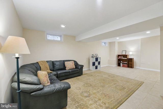 living room with recessed lighting, light tile patterned flooring, and baseboards