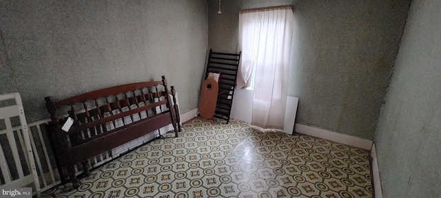 bedroom with baseboards