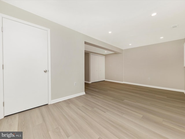 interior space with recessed lighting, light wood-style flooring, and baseboards